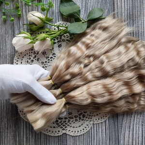 Doll hair. Made from natural Angora goat hair. Perfectly suitable as a hair for dolls. Mohair doll hair is also great for making doll wigs.