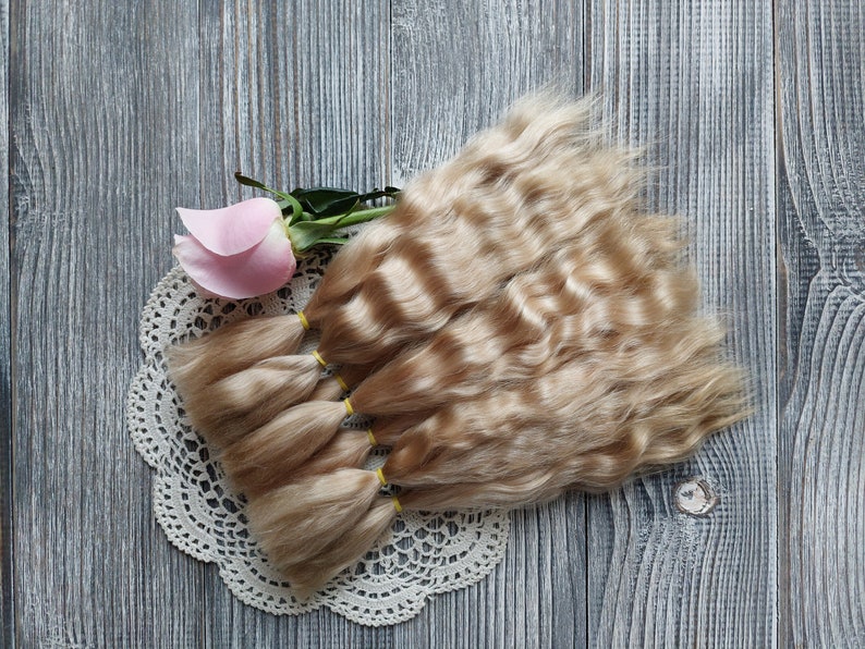 Doll hair. Made from natural Angora goat hair. Perfectly suitable as a hair for dolls. Mohair doll hair is also great for making doll wigs.