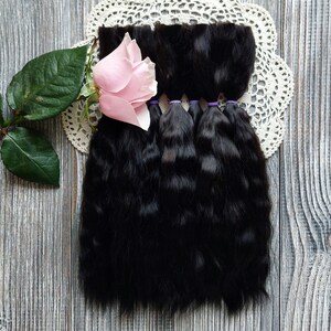 Close up of soft silky mohair fibers for doll wig making
