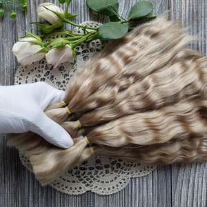 Doll hair. Made from natural Angora goat hair. Perfectly suitable as a hair for dolls. Mohair doll hair is also great for making doll wigs.