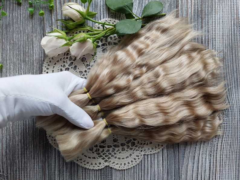 Doll hair. Made from natural Angora goat hair. Perfectly suitable as a hair for dolls. Mohair doll hair is also great for making doll wigs.