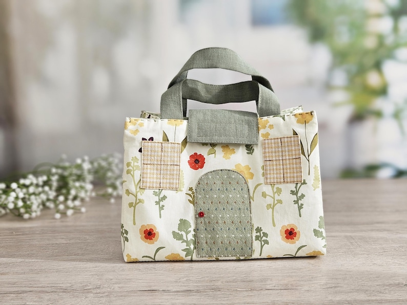 Dollhouse fabric bag for dolls, handmade toy carrier with floral print, front view