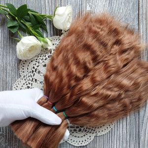 Doll hair. Made from natural Angora goat hair. Perfectly suitable as a hair for dolls. Mohair doll hair is also great for making doll wigs.