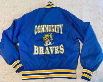 Vintage 1990s West Ark Bomber Jacket -- Youth Medium -- Medium Blue Nylon with Yellow and White Trim -- "Community Braves" Logo