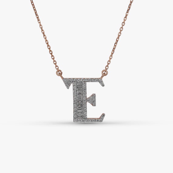 Charm pendant letter E with white stones gold plated