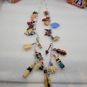 One of a kind, Cracker Jack, Antique Celluoid/ Plastic, Assorted Charm,  Necklace.