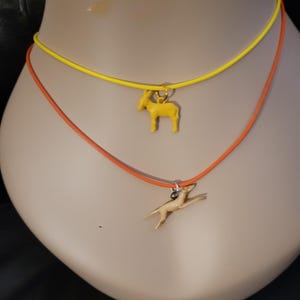 Two, Cracker Jack Charm Necklaces