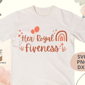 May include: White t-shirt featuring the text "Her Royal Fiveness" in brown lettering. The text is surrounded by a rainbow, stars, and balloons.