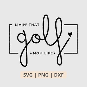 May include: Black and white graphic design with the text "Livin' That golf Mom Life" inside a square frame with a small heart in the top right corner.