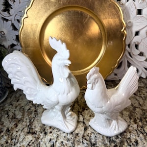 May include: A rustic wooden sign with the text "Welcome to our home" in white lettering. The sign features a distressed finish and a simple, inviting design, perfect for entryway decor.