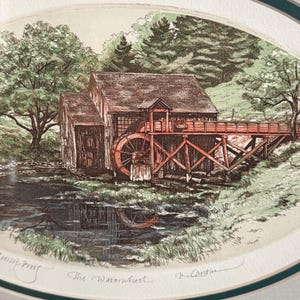 May include: An artistic print of a waterwheel mill, featuring a red waterwheel and bridge, set against a backdrop of green trees and a reflective pond. The text "The Waterwheel" is visible.