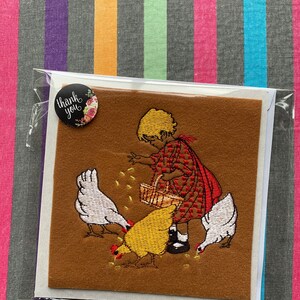 Petite fille et ses poules