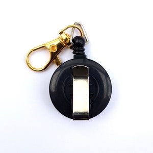 retractable reel for phone wallet or keys