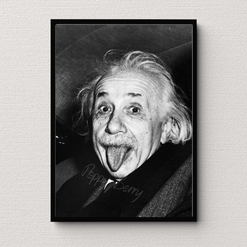 May include: Black and white portrait of Albert Einstein sticking his tongue out. The photo is signed "Poppy Berry" in the bottom right corner.