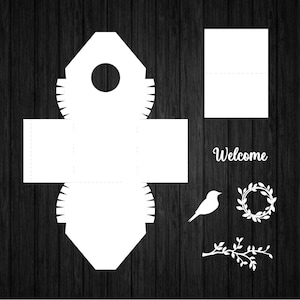 以下が含まれることがあります： 歓迎のサイン、鳥、花輪、葉のついた枝が付いた、鳥小屋の形をした箱の印刷可能なテンプレートです。テンプレートは、黒い木の背景に白で表示されています。