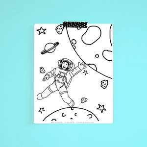 Coloriage fille afro-américaine astronaute dans l'espace imprimable en téléchargement numérique