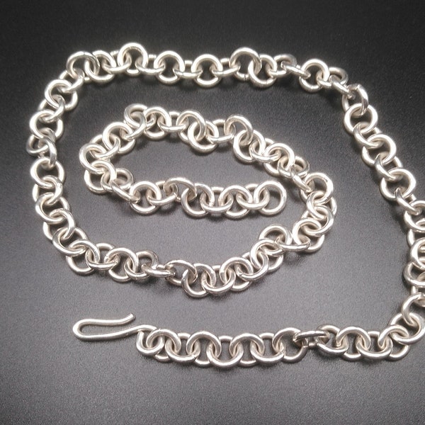 Handmade .925 Sterling Silver chain.  Twenty four and one half inches long from shepherd's hook to last link.