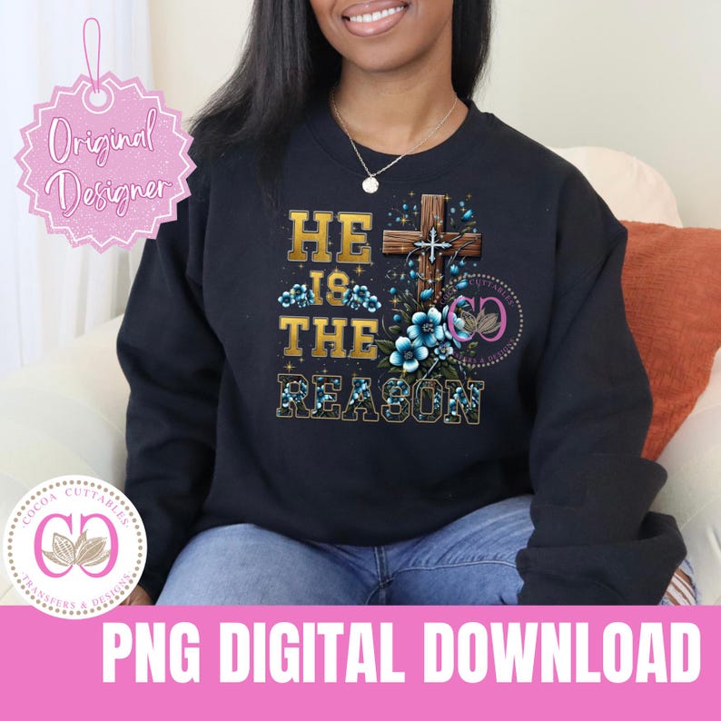 May include: A black sweatshirt with a gold and blue design featuring a cross with flowers and the text "He is the reason".