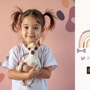 May include: A young girl smiles while holding a small, white and tan Chihuahua dog. The girl wears a white t-shirt. The background is a light pink with a rainbow and the word "Woof" in a playful font.
