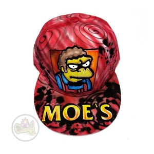 Moe&#39;s Snapback hat hand painted in the technique of airbrushing