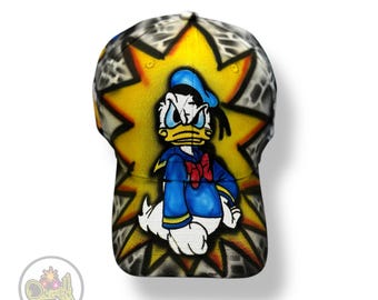 Färgglad Angry Duck-keps till salu, handmålad och unik streetwear-presentidé för män, tonåringar och samlare, djärv graffitikonst-hatt