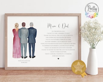 May include: A framed print with a light wood border features a watercolor illustration of a couple and a man, with text that reads "Mum & Dad." The print includes a poem and the date 06.08.2023. A gold seal reads "As Featured by Weddings."