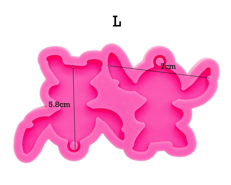 May include: Pink silicone mold for making two Stitch characters. The mold is 7 inches wide and 5.8 inches tall. The mold has a hole for hanging.