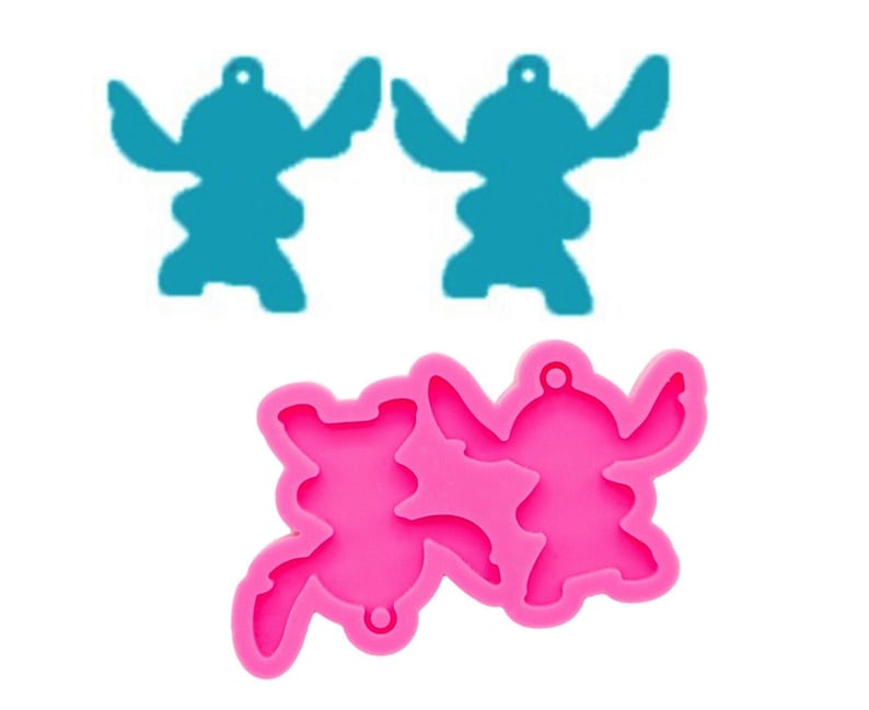 May include: Pink silicone mold with two Stitch character shapes. The mold is designed to create two Stitch charms.
