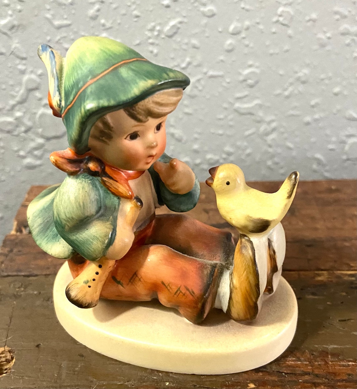 Goebel Hummel Figurine of Sitting Boy with Bird on feet marked Etsy