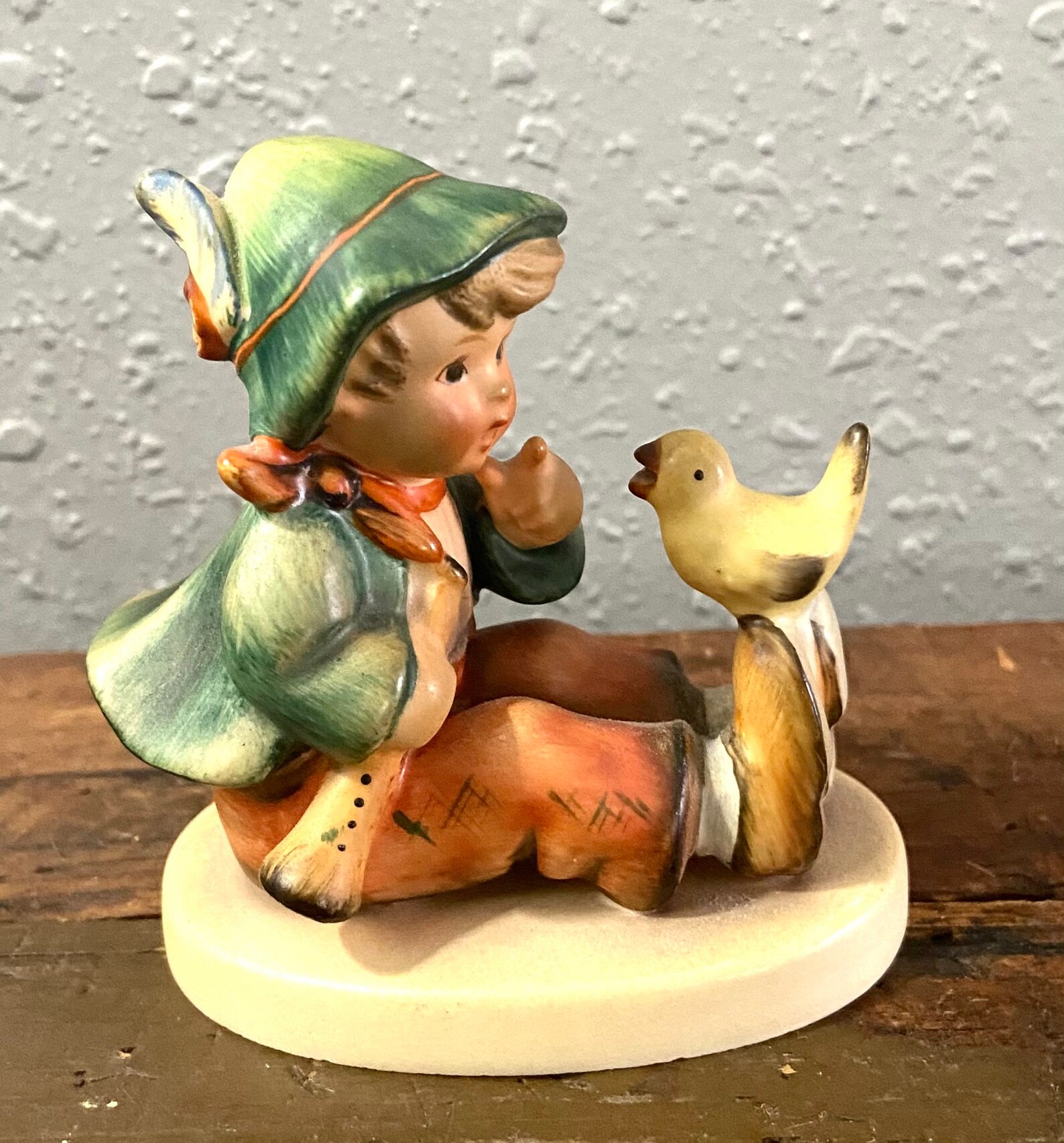 Goebel Hummel Figurine of Sitting Boy with Bird on feet marked Etsy