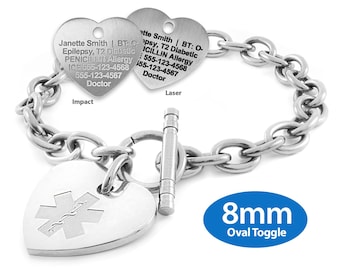 May include: A silver-toned medical alert bracelet with a chain link design. The bracelet features three heart-shaped charms. Two charms have engraved text, and one has a medical symbol. The bracelet has an 8mm oval toggle clasp.