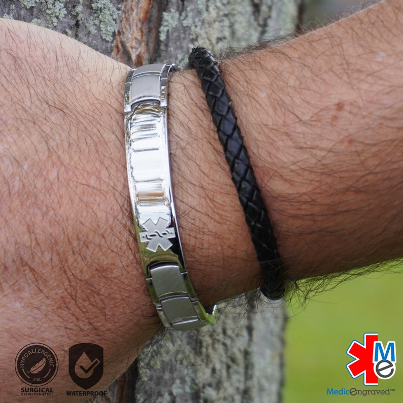 May include: A silver medical alert bracelet with a magnetic clasp. The bracelet features a medical symbol and the text "MedicEngraved". The bracelet is waterproof and hypoallergenic.