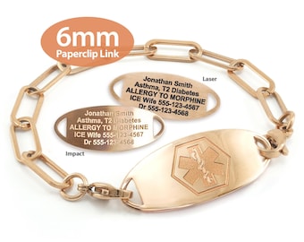 May include: A gold-colored medical ID bracelet with a 6mm paperclip link design. The bracelet features an oval plate with a medical symbol and two smaller plates with engraved medical information, including the name "Jonathan Smith", medical conditions, and contact details.