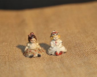 antique metal dolls