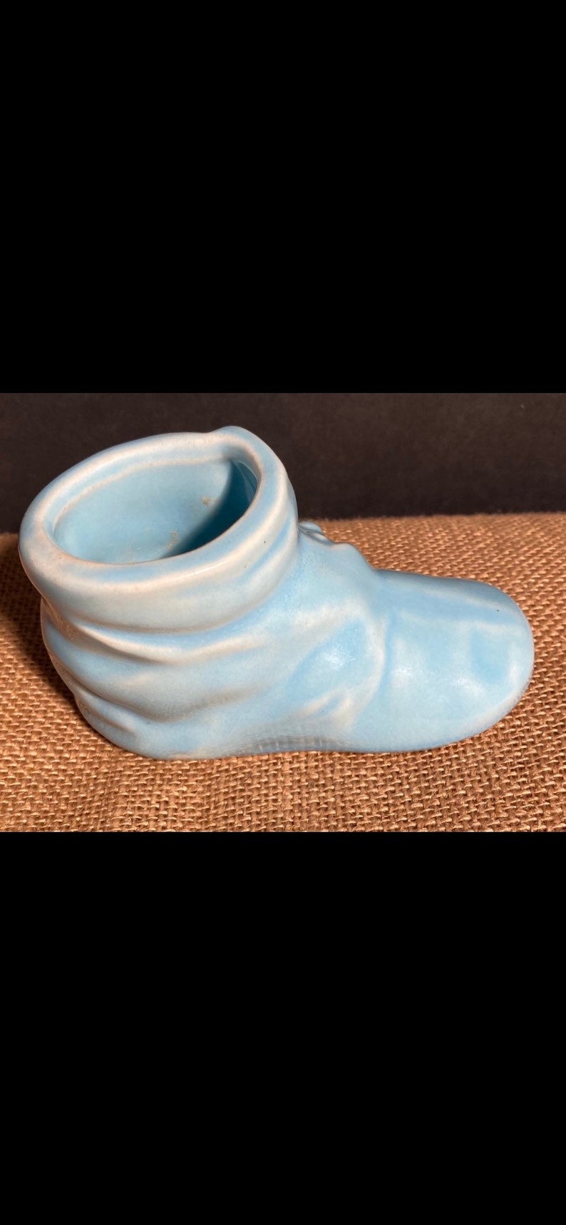 Vintage blue baby shoe planter