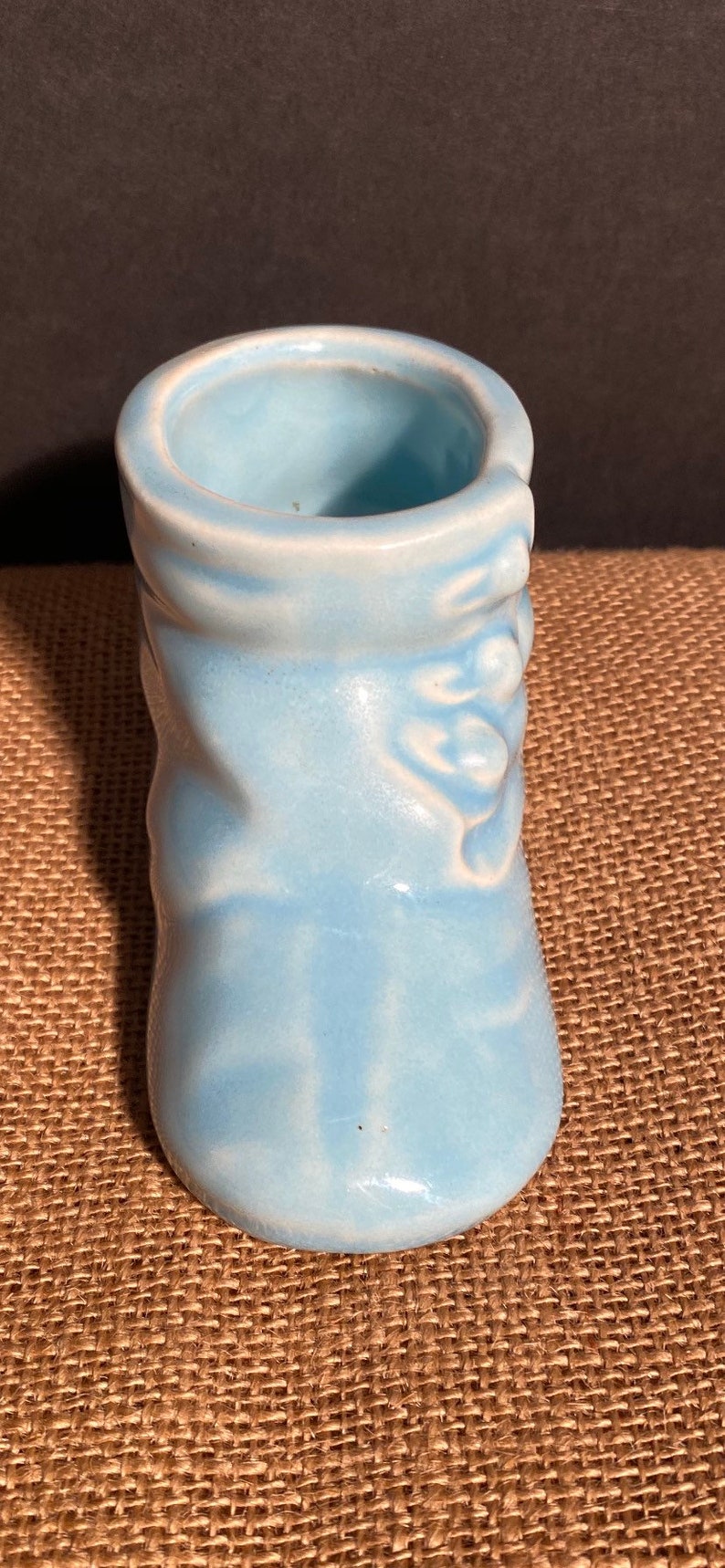 Vintage blue baby shoe planter