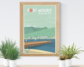 May include: A framed art print featuring a coastal scene with a pier extending into the water. The print has the text "PORT MOODY Rocky Point Pier" at the top. The artwork is in a light wood frame and is displayed on a wooden shelf with potted plants.