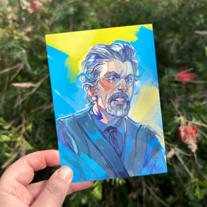 May include: A painting of a man with a gray beard and gray hair. He is wearing a dark blue jacket and has a serious expression on his face. The background is a blue and yellow gradient.