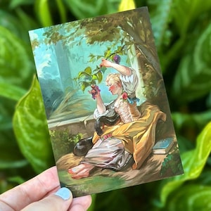 May include: A woman in a white and yellow dress sits in a garden setting, reaching for grapes on a vine. A black snake is curled around her arm. The scene is painted in a realistic style with vibrant colours.