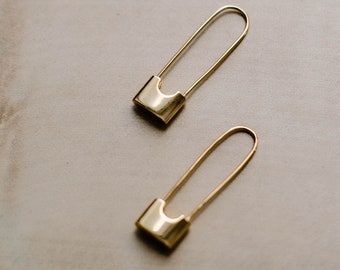 Gouden paperclip veiligheidsspeldoorbellen: 925 zilveren minimalistische ringen