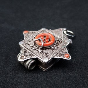 Locket or pendant box, pillbox, made of 925 silver and coral. Arabic style. Antique vintage jewel pendant. Collector. Trinket box collection