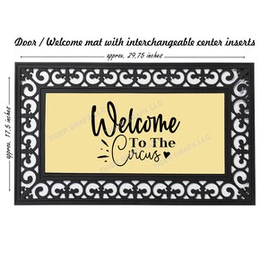 May include: Black welcome mat with a decorative border and a yellow center insert that says "Welcome to The Circus" with a heart.