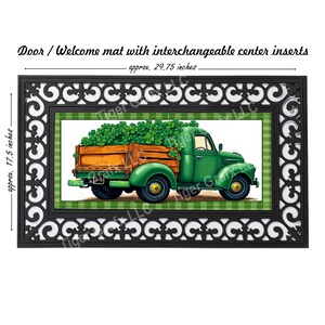 May include: A green truck with a wooden bed filled with shamrocks. The truck is on a welcome mat with a black and white patterned border. The mat is approximately 29.75 inches wide and 17.5 inches tall.