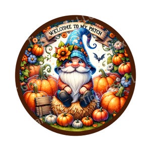 May include: A circular illustration featuring a gnome with a long white beard and a blue hat adorned with flowers. The gnome sits on a haystack surrounded by pumpkins, flowers, and a bat. The text "WELCOME TO MY PATCH" is displayed on a banner.
