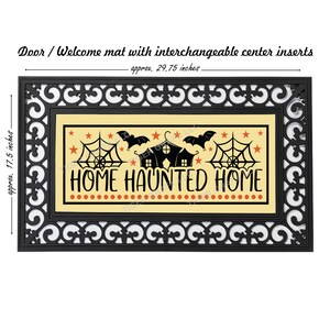 May include: Black doormat with a decorative border and a removable insert featuring a Halloween theme. The insert has a yellow background with black bats, orange stars, and spiderwebs. The text "HOME HAUNTED HOME" is in black letters.