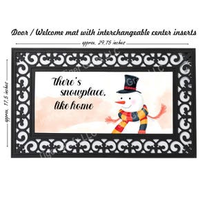 May include: A black doormat with a white border and a snowman design. The snowman is wearing a black top hat, a red and yellow scarf, and has a white background with the text "There's snowplace, like home". The doormat measures approximately 29.75 inches by 17.5 inches.