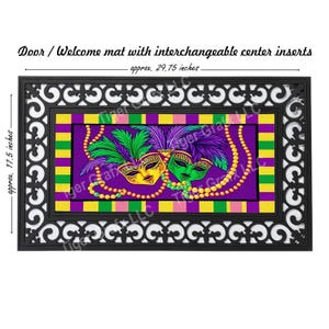 May include: A black doormat with a decorative border and a center insert featuring two Mardi Gras masks with green, purple, and gold beads. The masks are on a purple background with green, yellow, and pink stripes. The doormat measures approximately 29.75 inches by 17.5 inches.