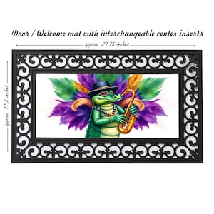 May include: A doormat with a black frame and a white background featuring a green alligator wearing a top hat and playing a gold saxophone. The alligator is surrounded by purple, green, and gold feathers. The doormat measures approximately 29.75 inches by 17.5 inches.