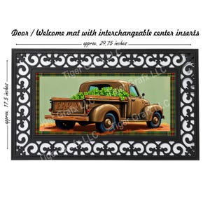 May include: A brown and green welcome mat with a black border and a design of a vintage pickup truck with a "FARM" sign on the side. The truck is filled with green shamrocks and is driving on a green and brown plaid background.