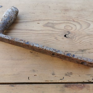 Hand crank handle, rusted metal parts, industrial equipment